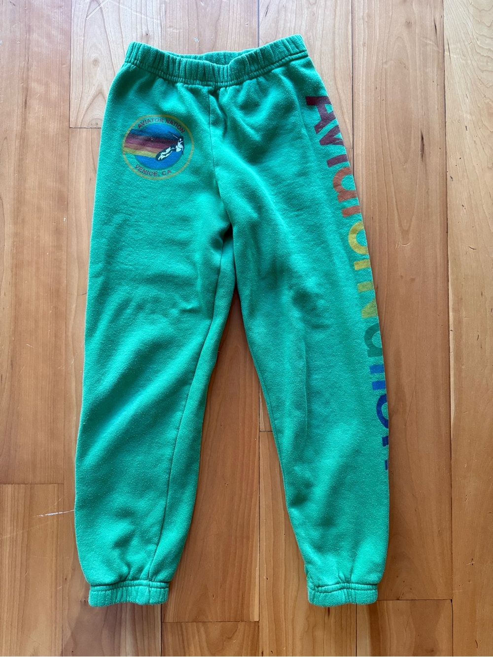 Aviator Nation Green Sweatpants with Rainbow Side Script